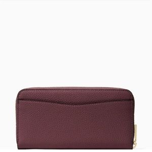 Kate Spade Leila Large Continental Wallet
COLOR: Cherrywood